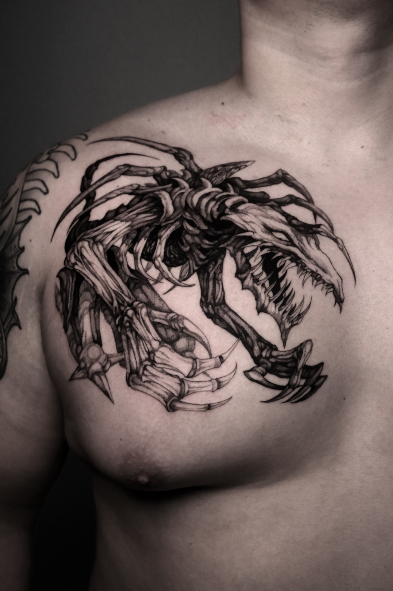 SkullGreymon, Digimon tattoo by Mark Worst, freehand dark fantasy style, Los Angeles