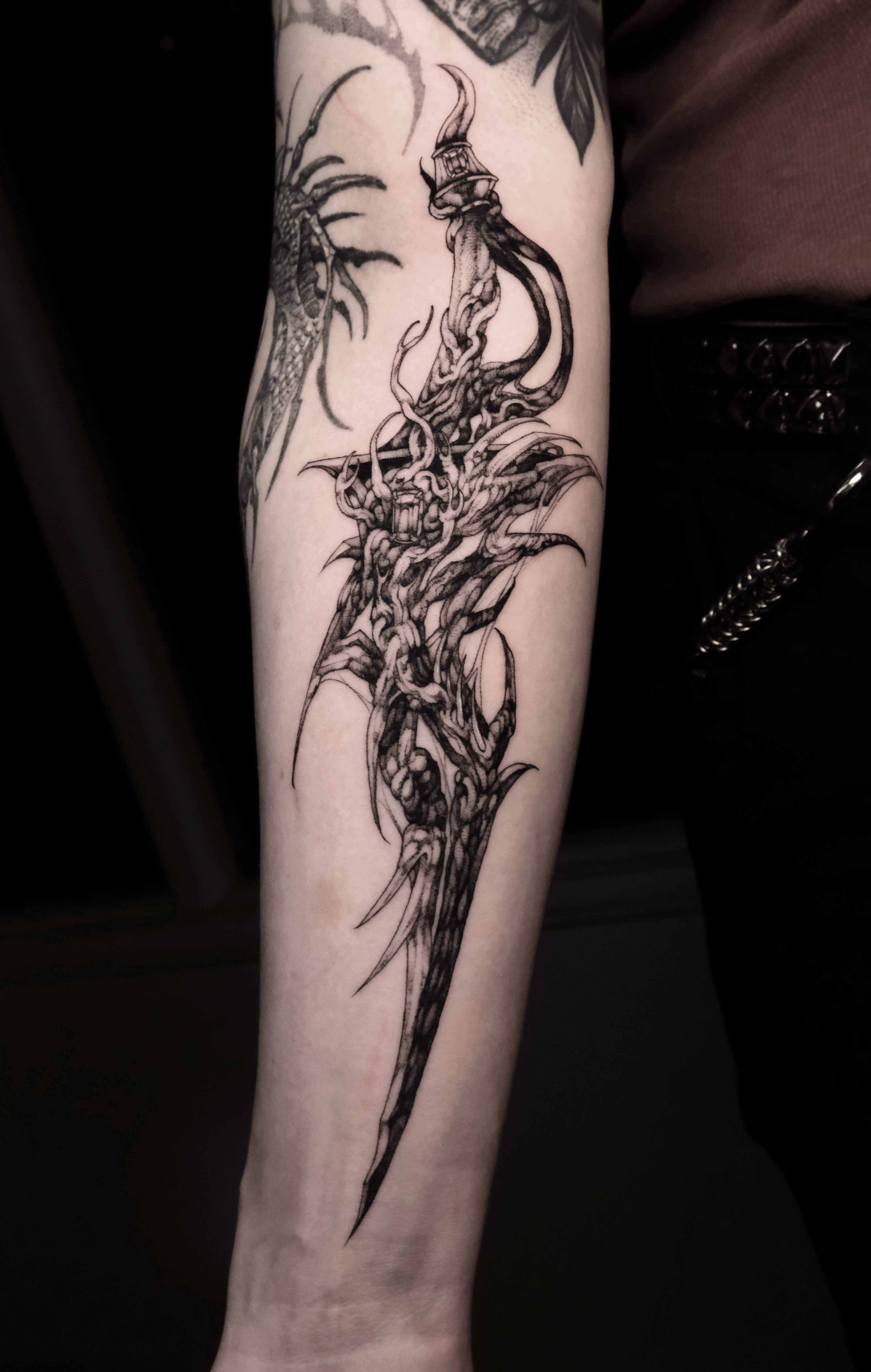Root Blade, Dark Fantasy tattoo by Mark Worst, freehand dark fantasy style, Los Angeles